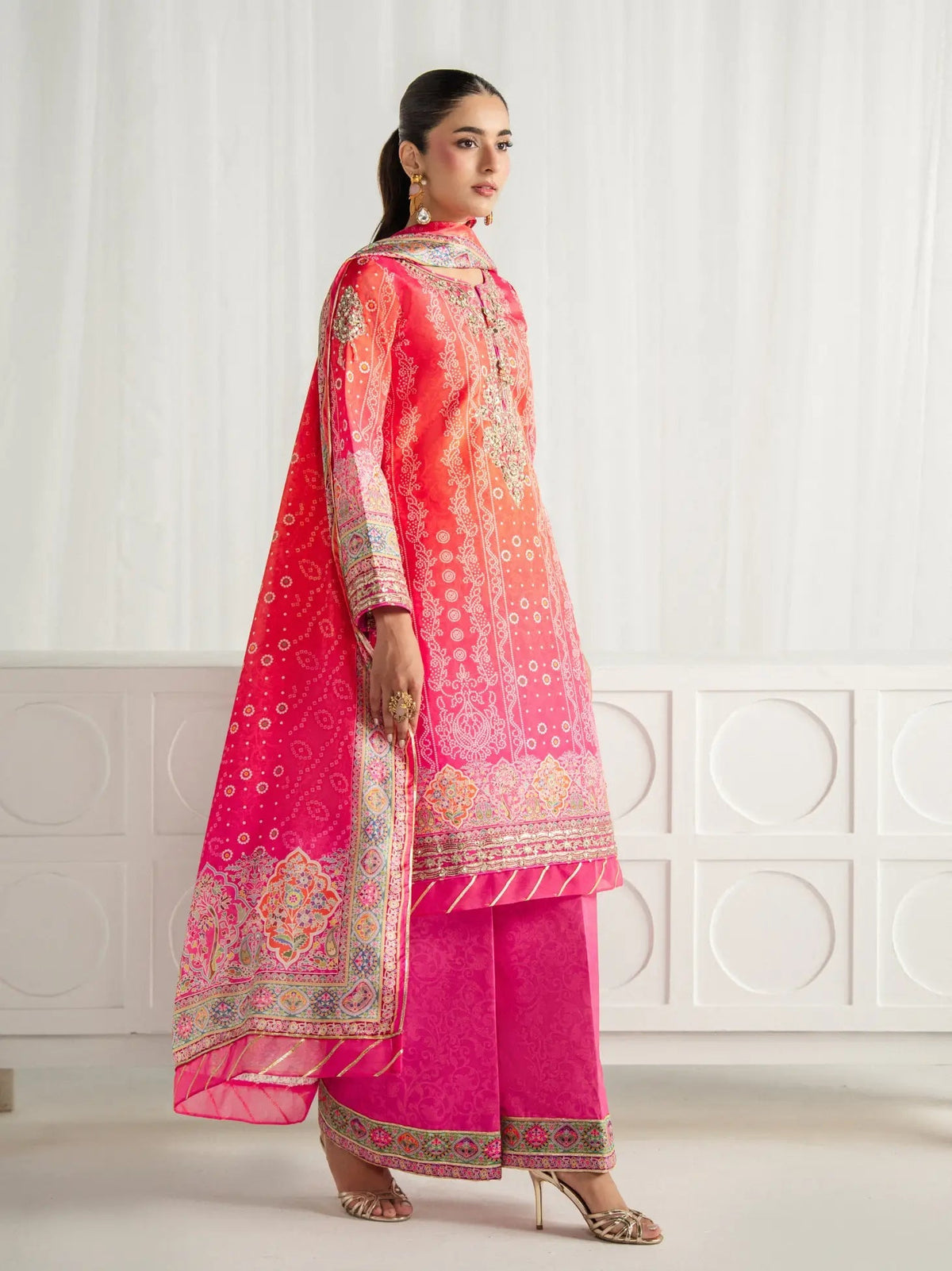 Gulaal | Aira Printed Silk | Marigold Dusk - Luxury Dress - available at Maria Faisal in UK and USA.
