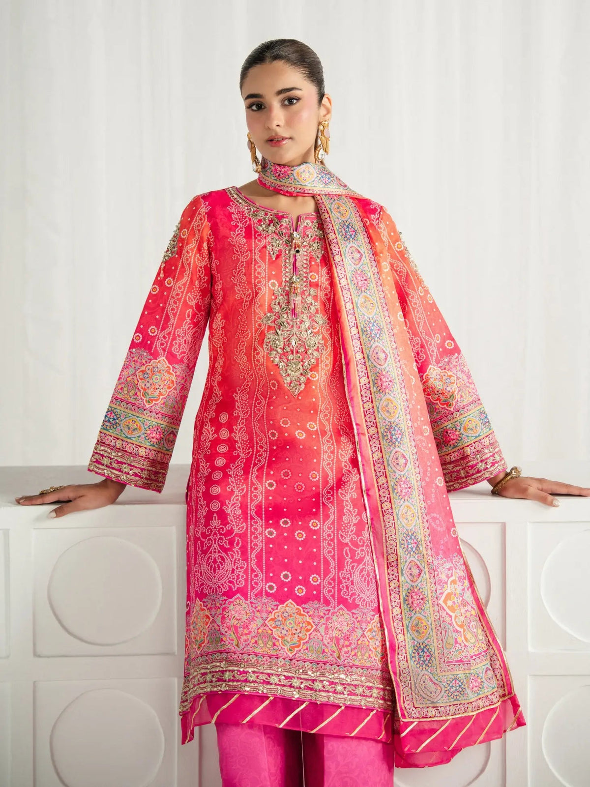 Gulaal | Aira Printed Silk | Marigold Dusk - Luxury Dress - available at Maria Faisal in UK and USA.