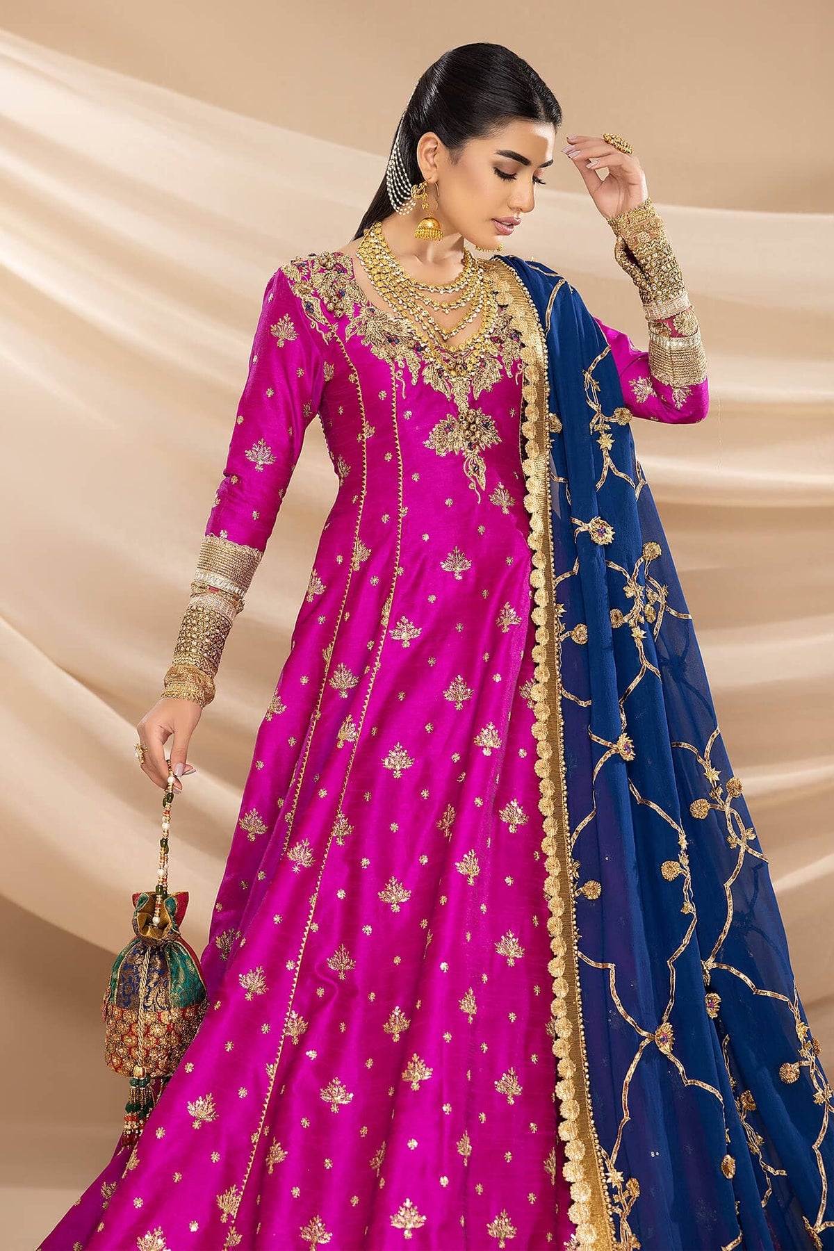 Nilofer Shahid | Shama e Mehfil | Nawazish - Bridal Dress - available at Maria Faisal in UK and USA.