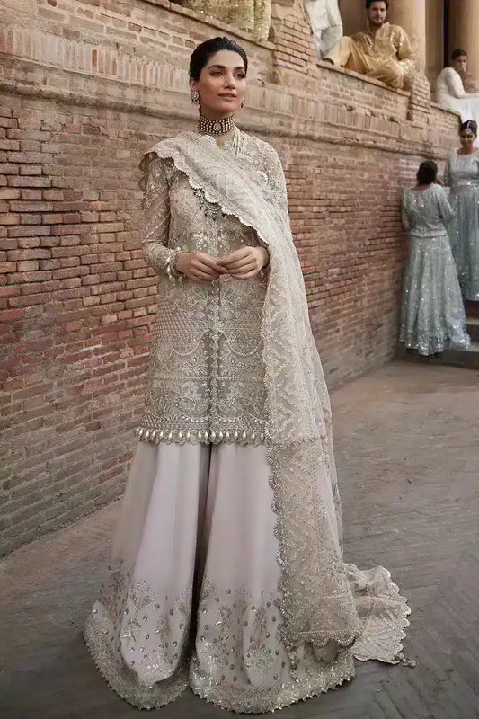Afrozeh Dastangoi Wedding Formals Meharbano– Powder Pink Pakistani Dress with intricate embroidery and embellishments. Shop elegant Asian dresses at Maria Faisal.