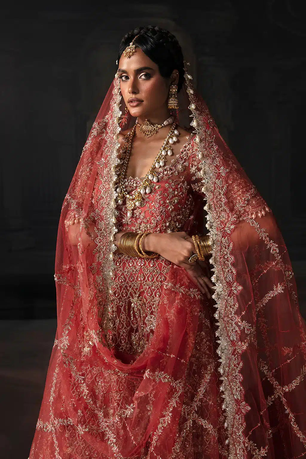 Afrozeh The Brides Edit 23 Lavinia – Rust Pakistani Bridal Dress with intricate embroidery and embellishments. Shop elegant Asian dresses at Maria Faisal.