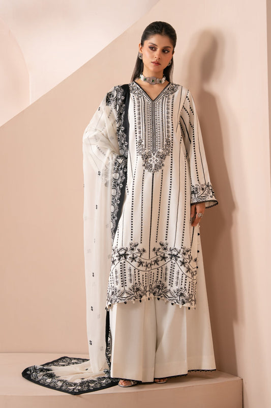 Xenia Formals | Zaeva Formals | OMAVI - Formal Dress - available at Maria Faisal in UK and USA.