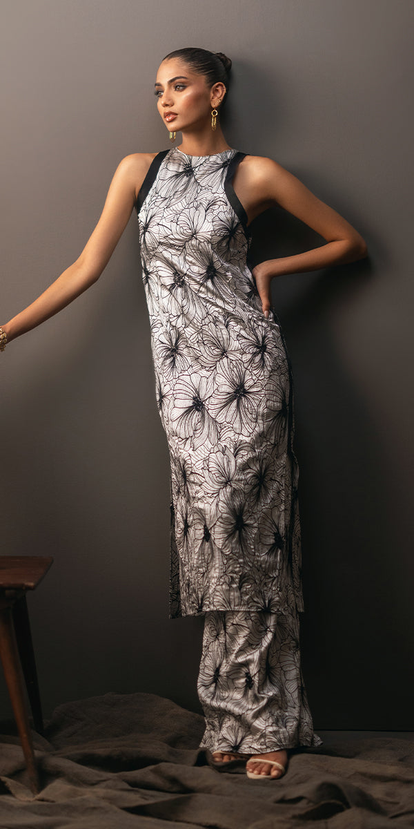 Erum Khan | Beyond Chic |  Crown Jewel - Designer Dress with Intricate embroidery and embellishments. Shop elegent wedding dress at Maria Faisal.